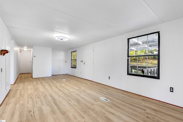 unfurnished room featuring light wood-type flooring