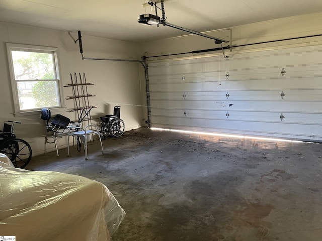 garage featuring a garage door opener