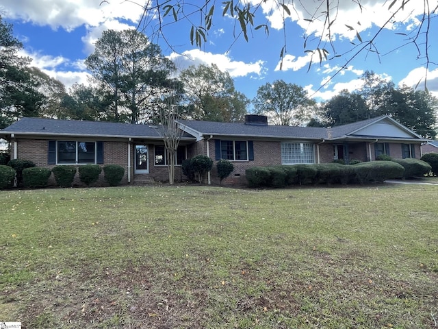 ranch-style home featuring a front yard