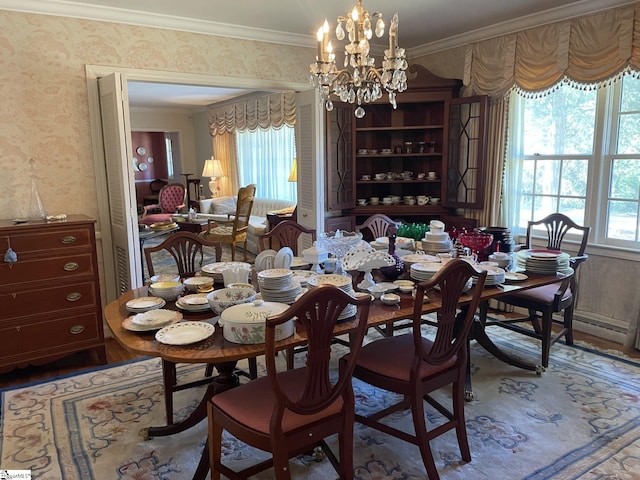 dining area with a notable chandelier and ornamental molding