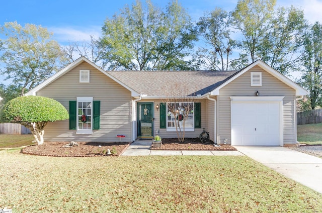 single story home featuring a front lawn and a garage