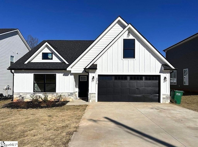 modern farmhouse style home featuring a garage