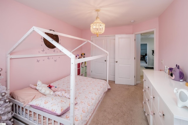 bedroom with light colored carpet and an inviting chandelier