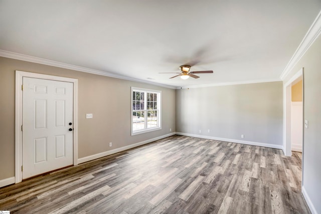 interior space with light hardwood / wood-style flooring, ceiling fan, and ornamental molding