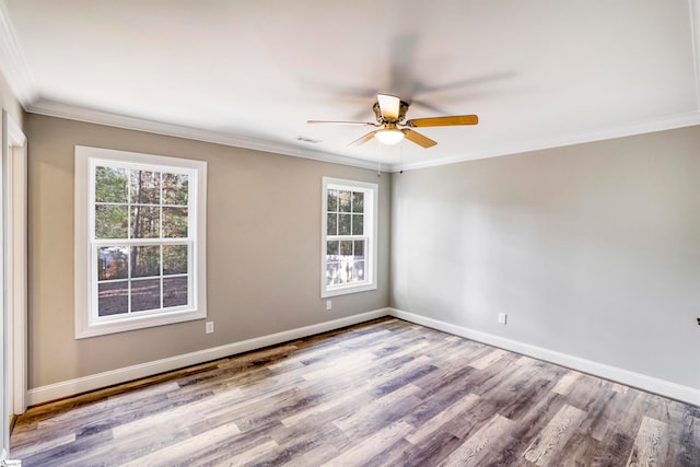 unfurnished room with crown molding, ceiling fan, and light wood-type flooring