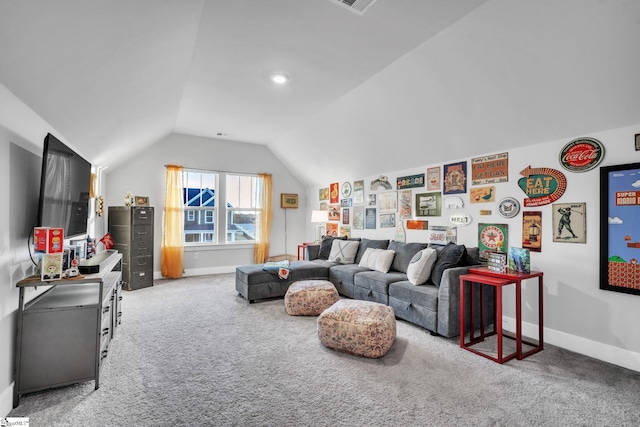 carpeted living room with lofted ceiling