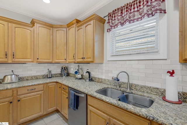 kitchen featuring stainless steel dishwasher, light stone counters, ornamental molding, and sink