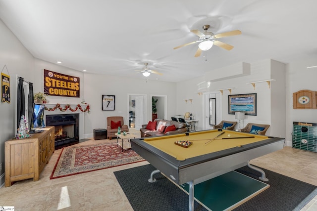 recreation room featuring ceiling fan, light tile patterned floors, and billiards