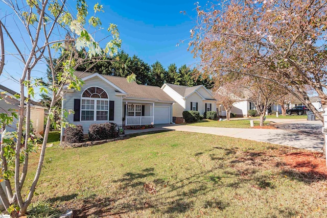 ranch-style home featuring a garage and a front lawn