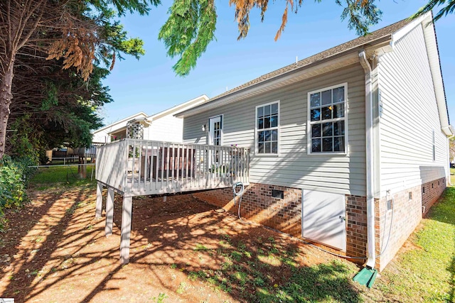 rear view of house with a deck