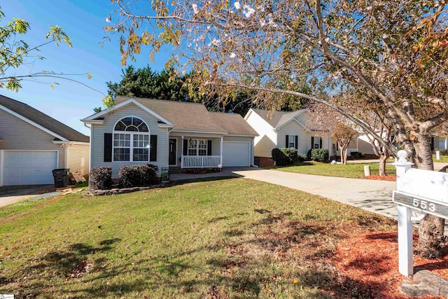 single story home with a garage and a front lawn