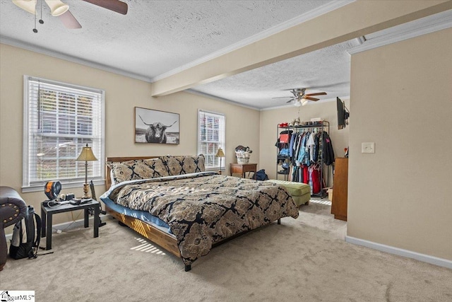 bedroom with multiple windows, light carpet, ceiling fan, and ornamental molding