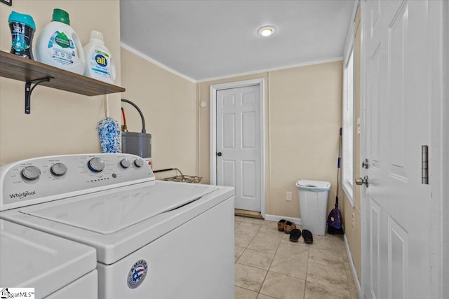 washroom with light tile patterned floors, washer and clothes dryer, ornamental molding, and water heater