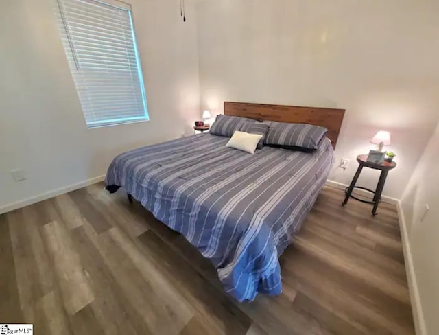 bedroom featuring hardwood / wood-style flooring