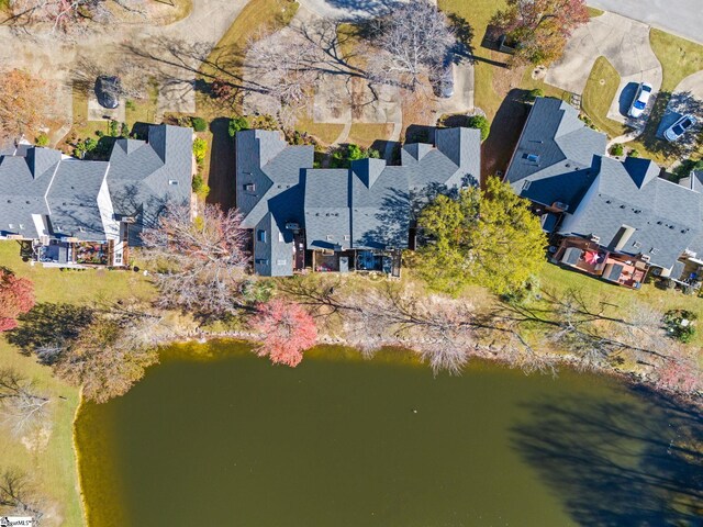 drone / aerial view with a water view