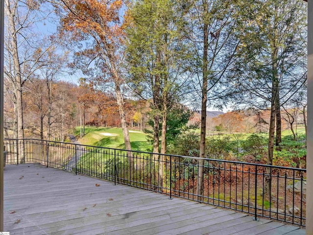 wooden deck with a mountain view