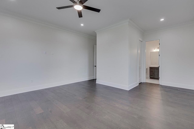 empty room featuring ceiling fan, crown molding, and dark wood-type flooring