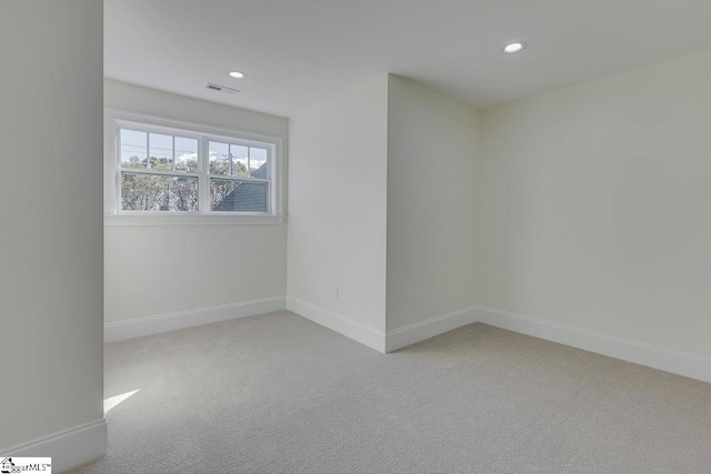 spare room with carpet flooring