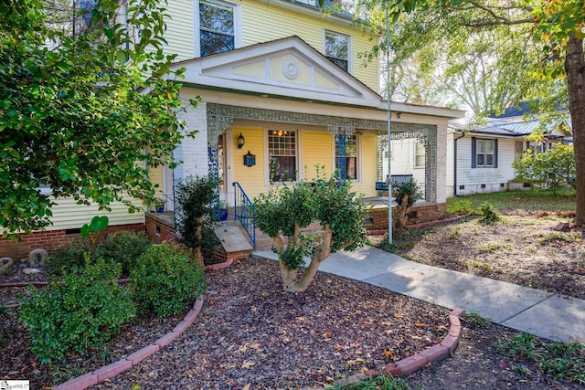 view of front of property featuring covered porch