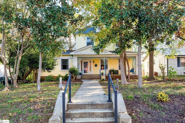 view of front of home featuring covered porch