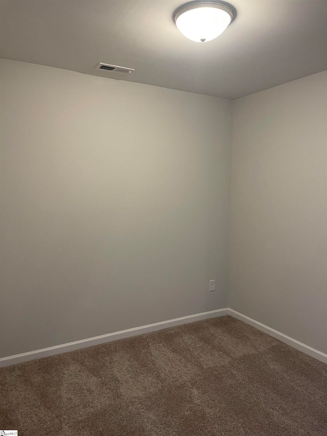 spare room with carpet flooring