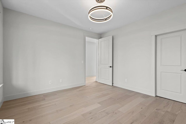 unfurnished bedroom featuring light hardwood / wood-style floors