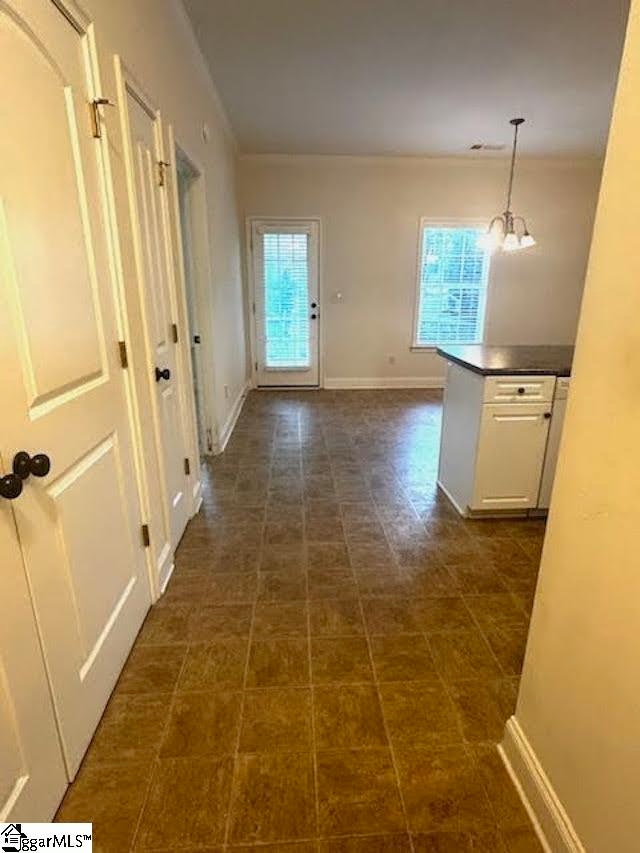 hallway with baseboards