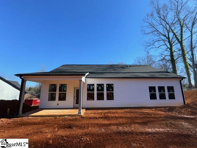 back of property with a patio area