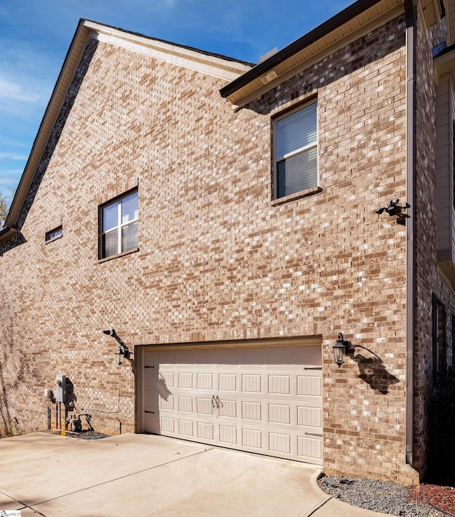 view of property exterior with a garage