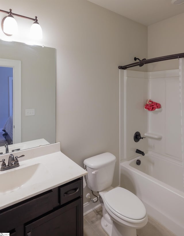 full bathroom featuring tile patterned flooring, vanity, toilet, and bathing tub / shower combination