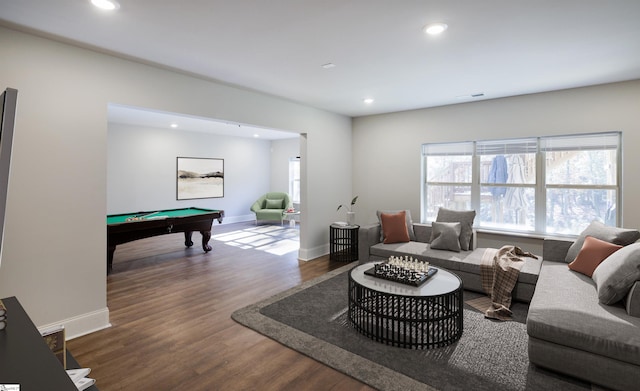 living room featuring dark hardwood / wood-style flooring and pool table