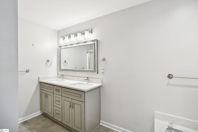 bathroom featuring tile patterned floors and vanity