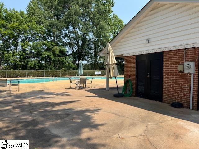 164 Buckstone Ln, Spartanburg, SC 29307 - community pool featuring a patio