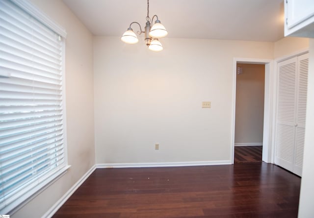 164 Buckstone Ln, Spartanburg, SC 29307 - unfurnished dining area featuring wood finished floors and a chandelier