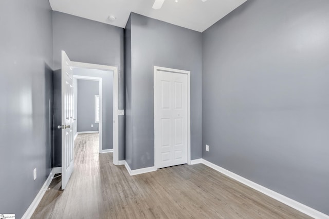 unfurnished room featuring ceiling fan and light hardwood / wood-style flooring