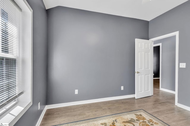 unfurnished room featuring wood-type flooring