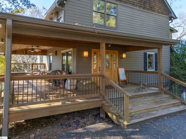 exterior space featuring ceiling fan and covered porch