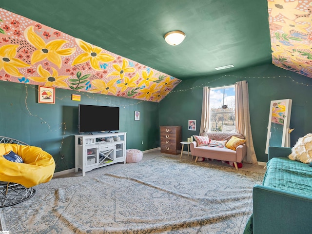 carpeted living room with vaulted ceiling