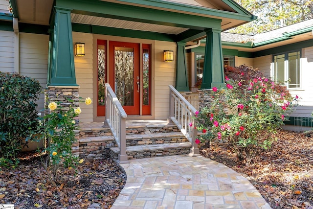 property entrance featuring a porch