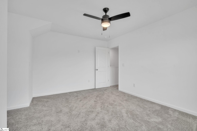 empty room with light carpet and ceiling fan