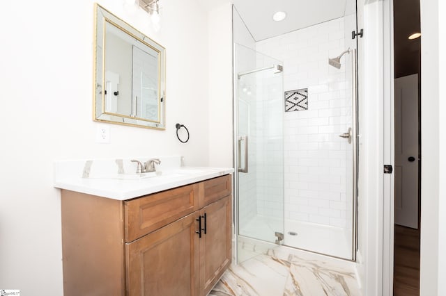 bathroom featuring vanity and walk in shower