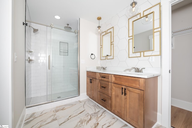 bathroom featuring vanity and an enclosed shower