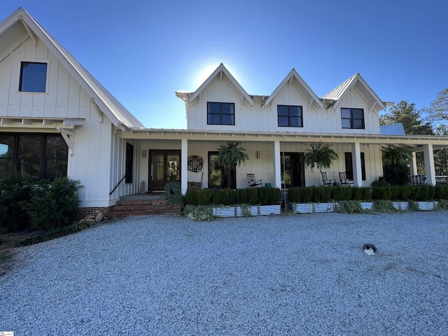 modern farmhouse with a porch