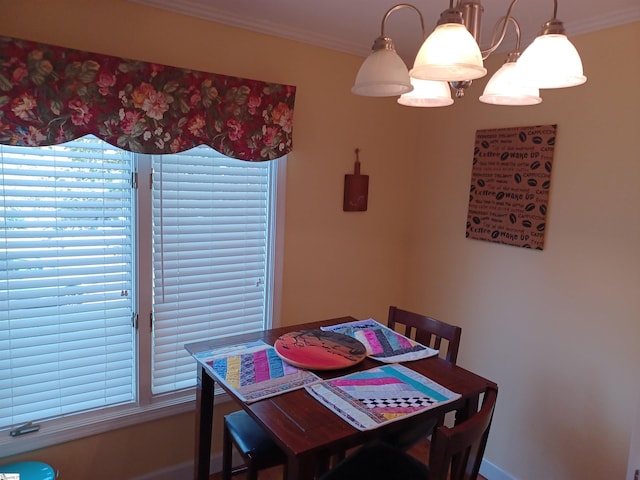 dining space with crown molding