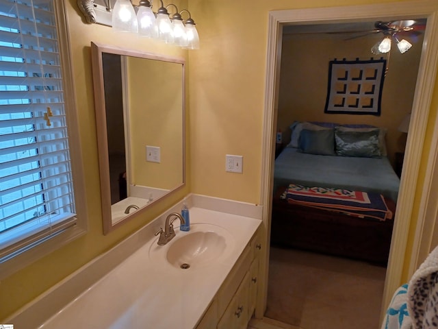 bathroom with vanity and ceiling fan