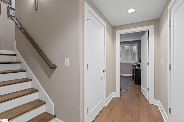 stairway with wood-type flooring