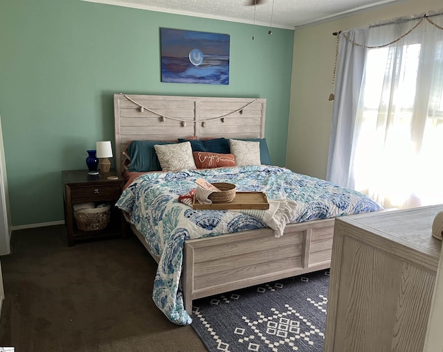 carpeted bedroom with a textured ceiling