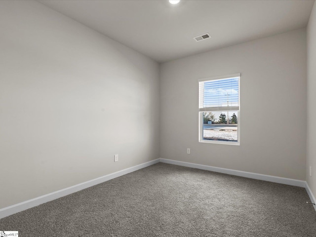 view of carpeted spare room