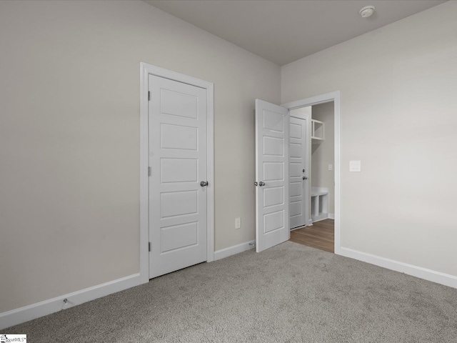 unfurnished bedroom featuring carpet