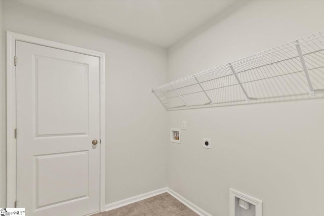 laundry area featuring hookup for an electric dryer and hookup for a washing machine